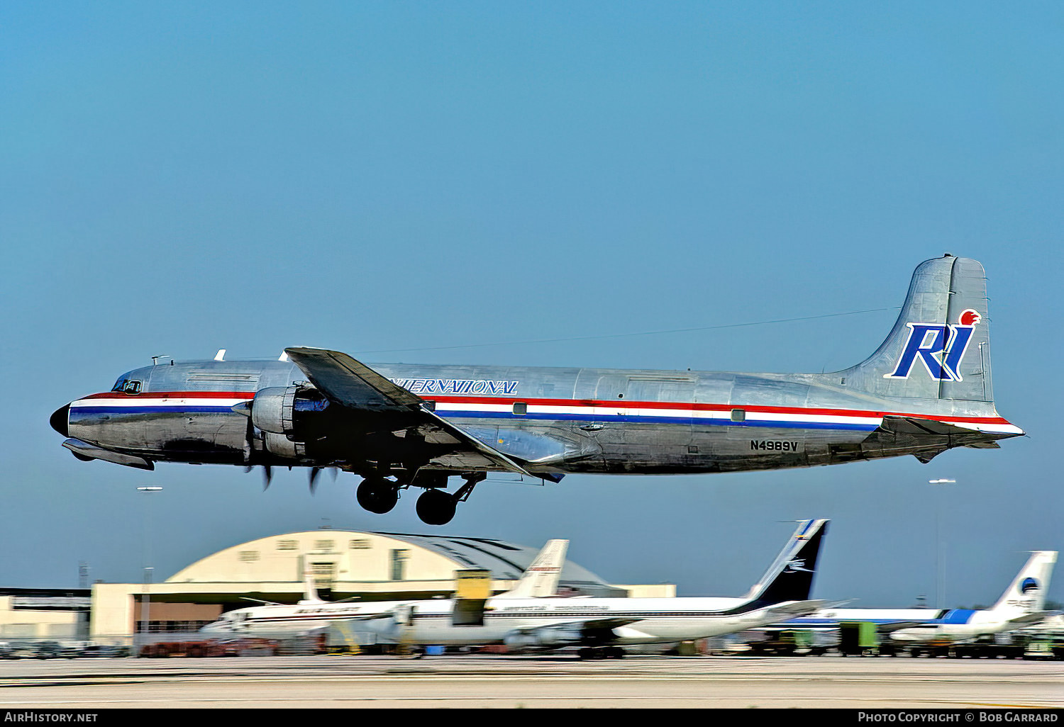 Aircraft Photo of N4989V | Douglas C-118A Liftmaster (DC-6A) | Rich International Airways | AirHistory.net #35286