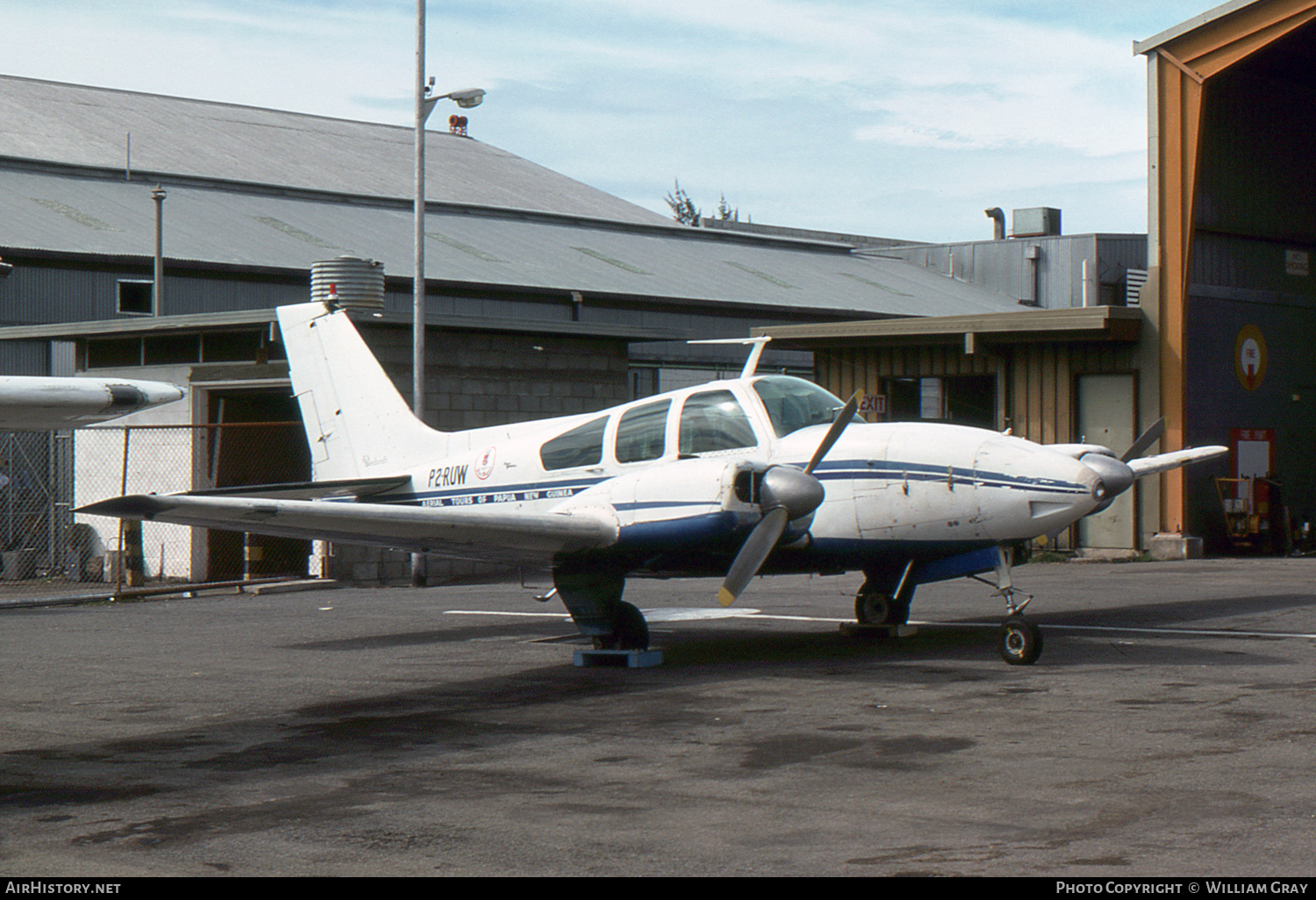 Aircraft Photo of P2-RUW | Beech C55 Baron (95-C55) | Aerial Tours | AirHistory.net #50091