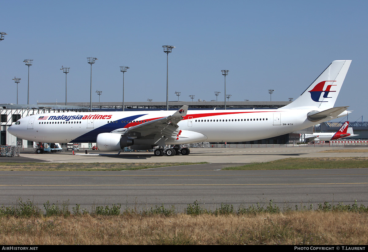 Aircraft Photo of 9M-MTH | Airbus A330-323 | Malaysia Airlines | AirHistory.net #153660