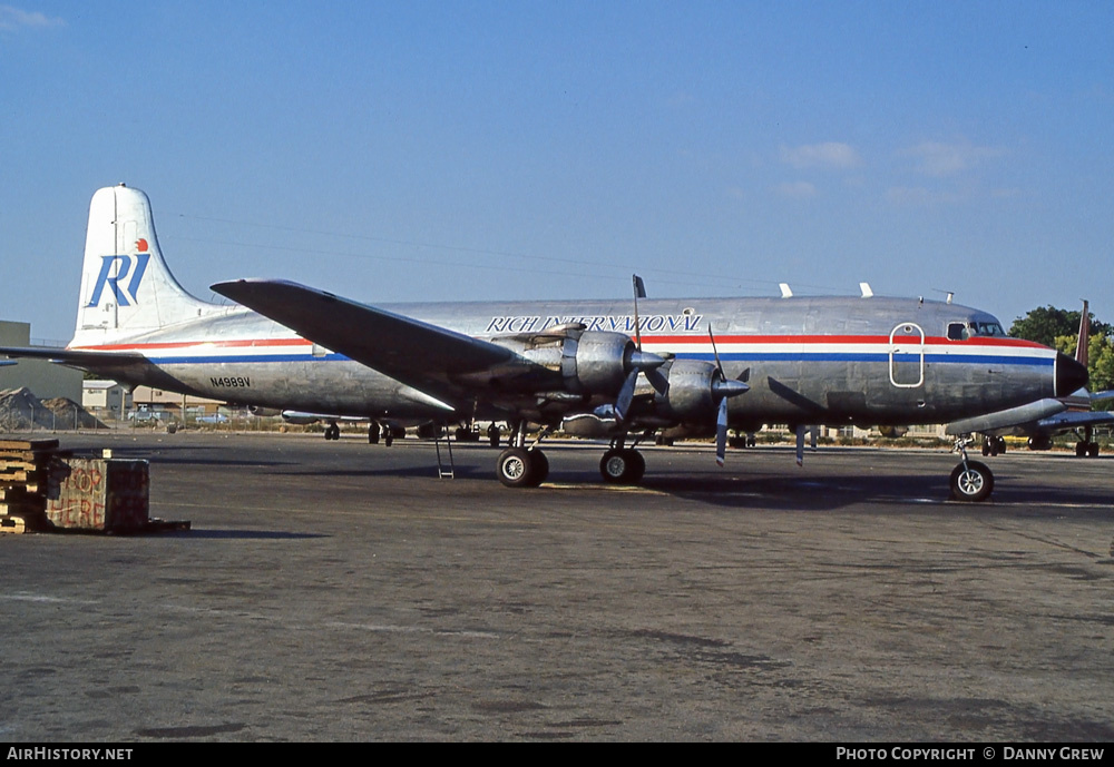 Aircraft Photo of N4989V | Douglas C-118A Liftmaster (DC-6A) | Rich International Airways | AirHistory.net #249478