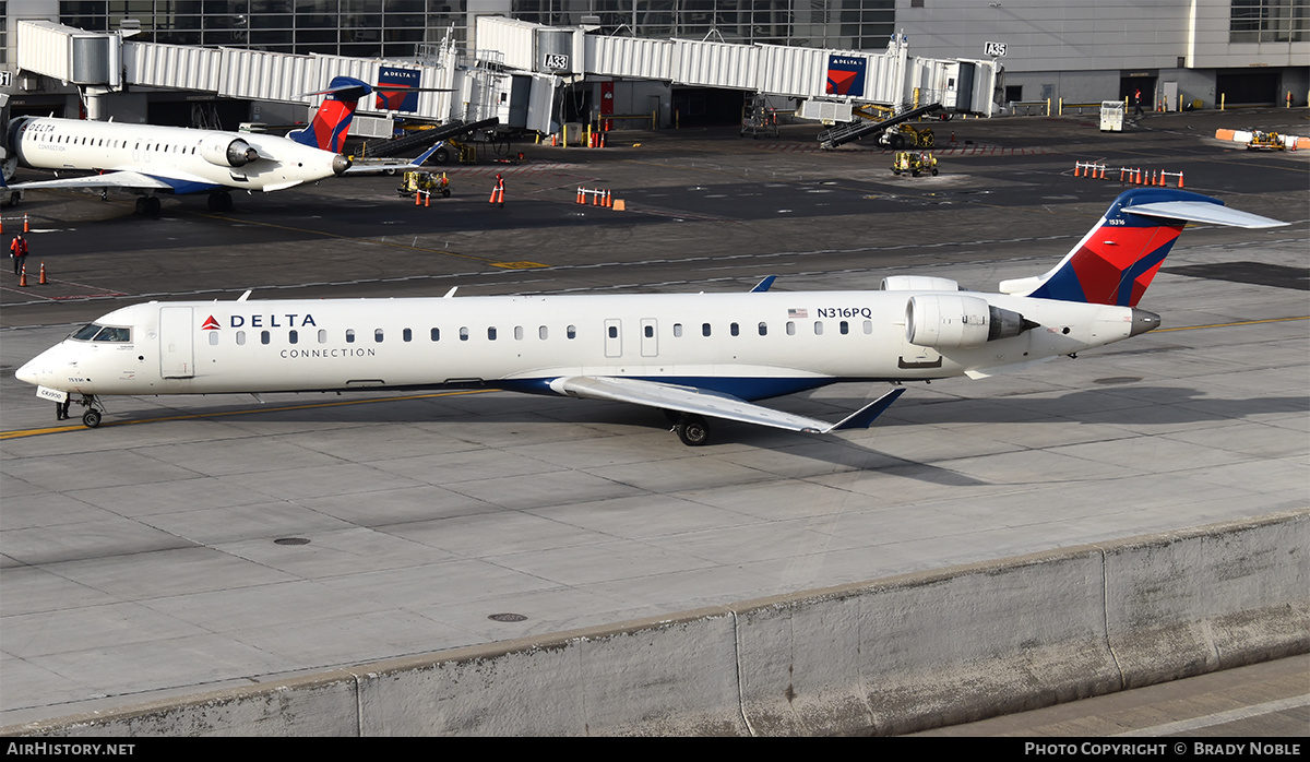 Aircraft Photo of N316PQ | Bombardier CRJ-900LR (CL-600-2D24) | Delta Connection | AirHistory.net #305752