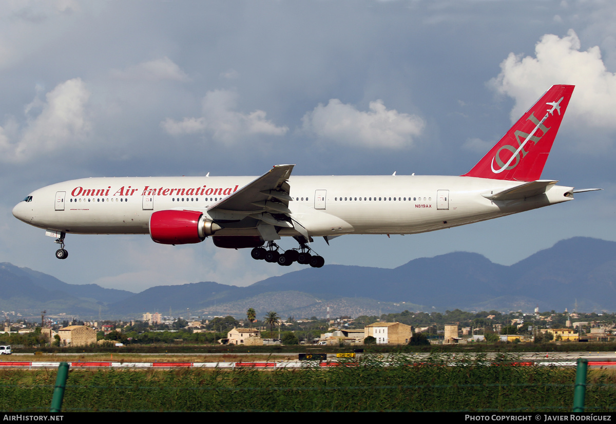 Aircraft Photo of N819AX | Boeing 777-2U8/ER | Omni Air International - OAI | AirHistory.net #563900