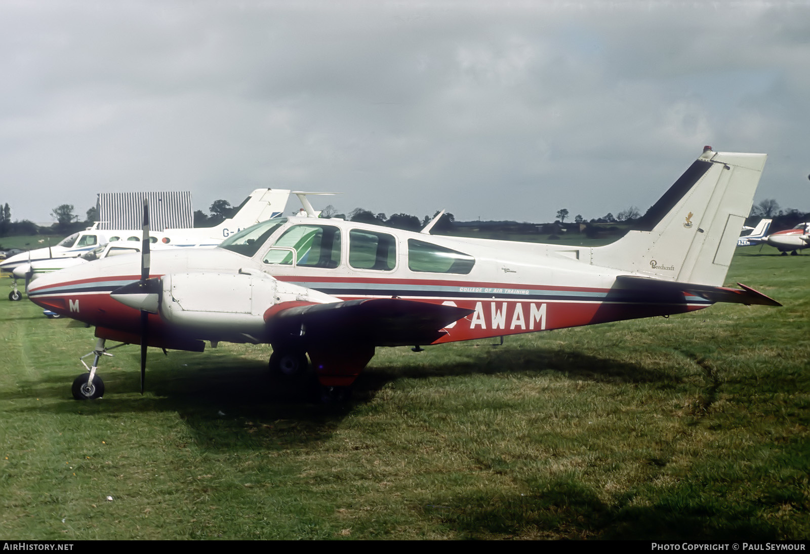 Aircraft Photo of G-AWAM | Beech 95-D55 Baron | College of Air Training | AirHistory.net #567419