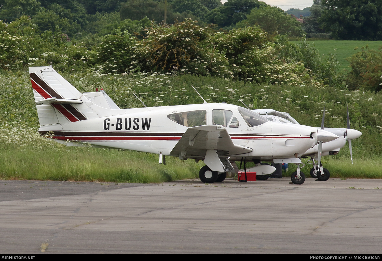 Aircraft Photo of G-BUSW | Rockwell Commander 114 | AirHistory.net #692548