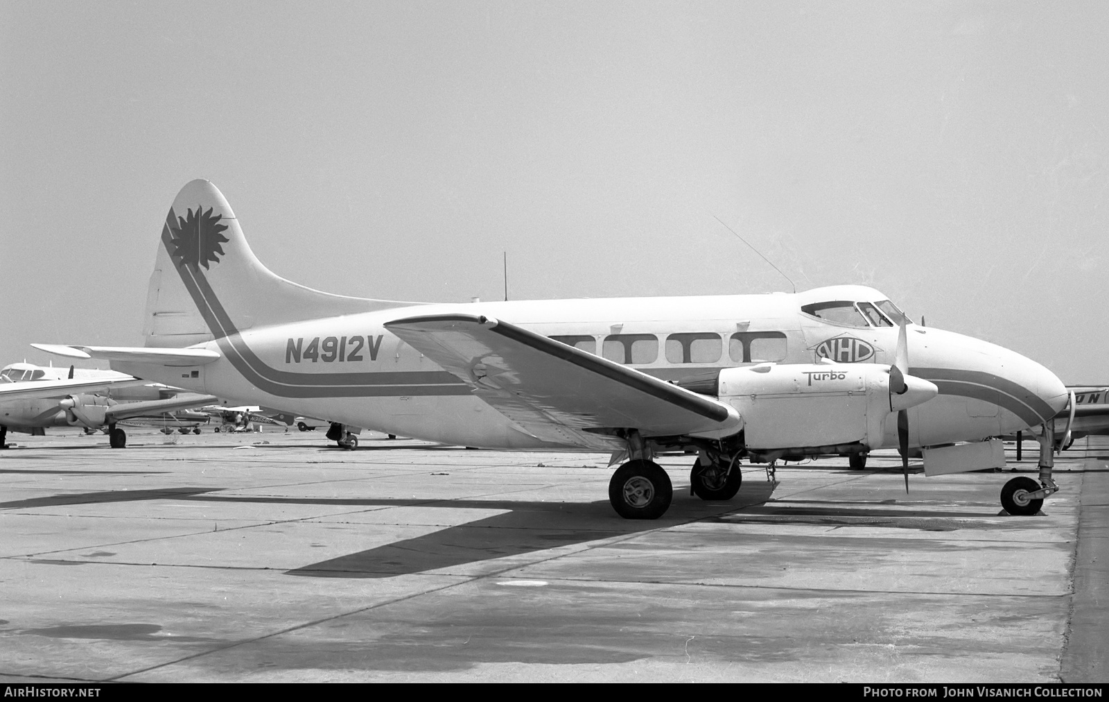 Aircraft Photo of N4912V | De Havilland D.H. 104 Dove 5A | NHD - National Home Developers | AirHistory.net #723568