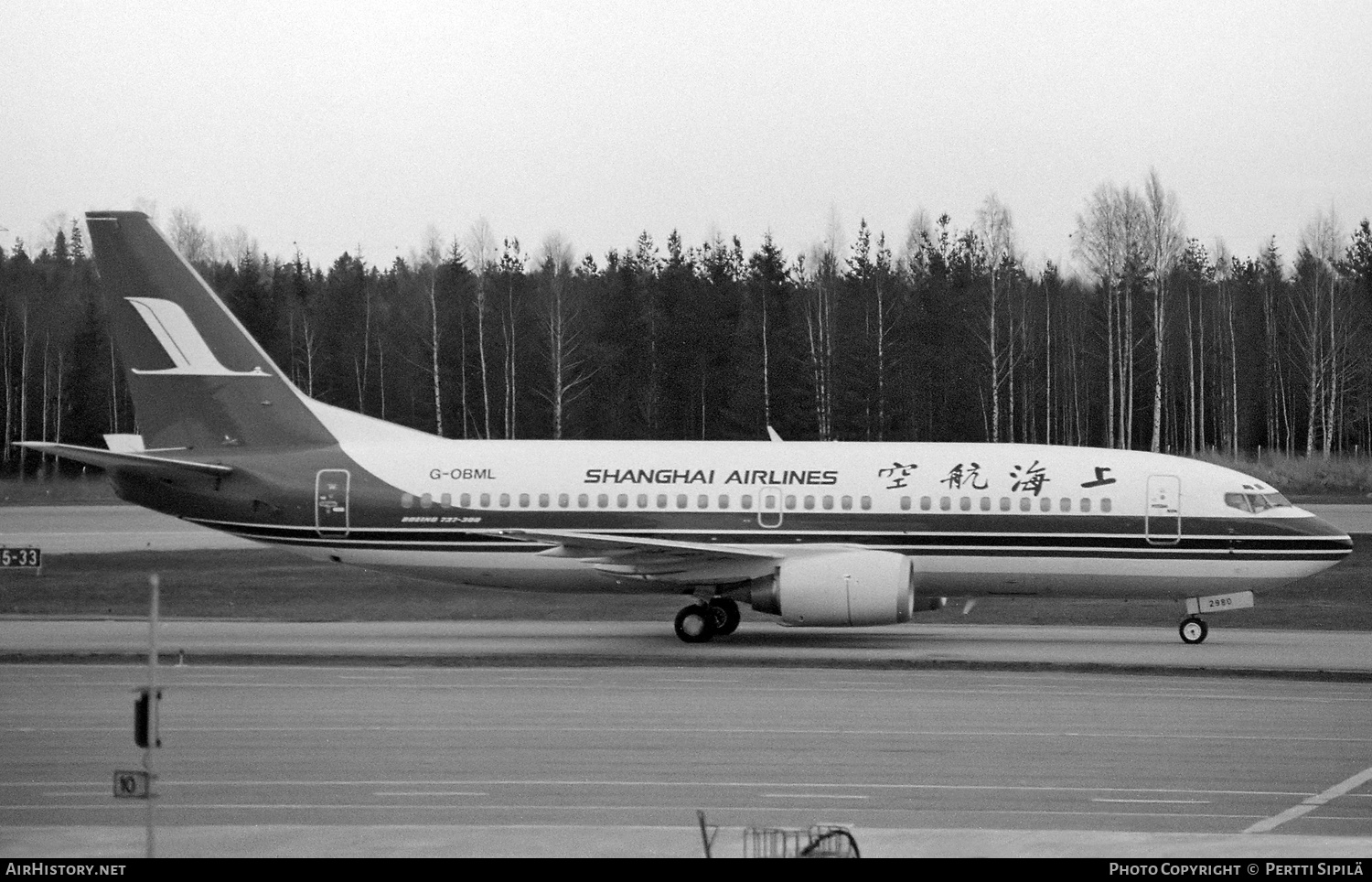 Aircraft Photo of G-OBML | Boeing 737-3Q8 | Shanghai Airlines | AirHistory.net #788661